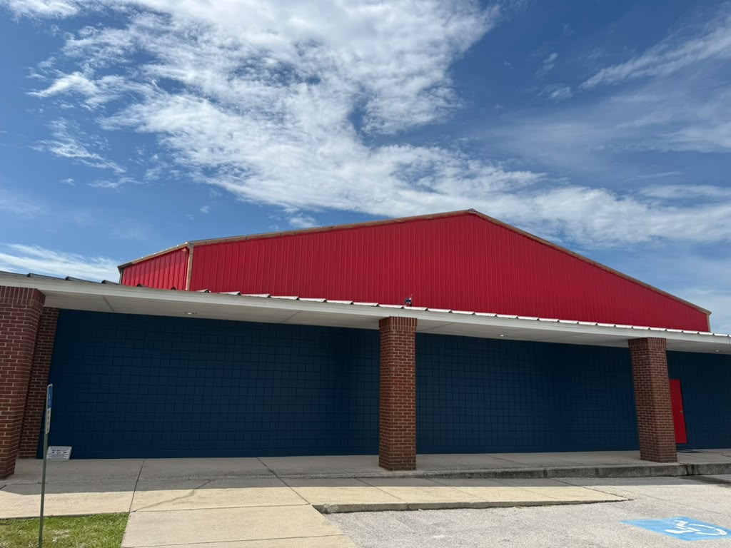 All Saints Academy blue and red exterior