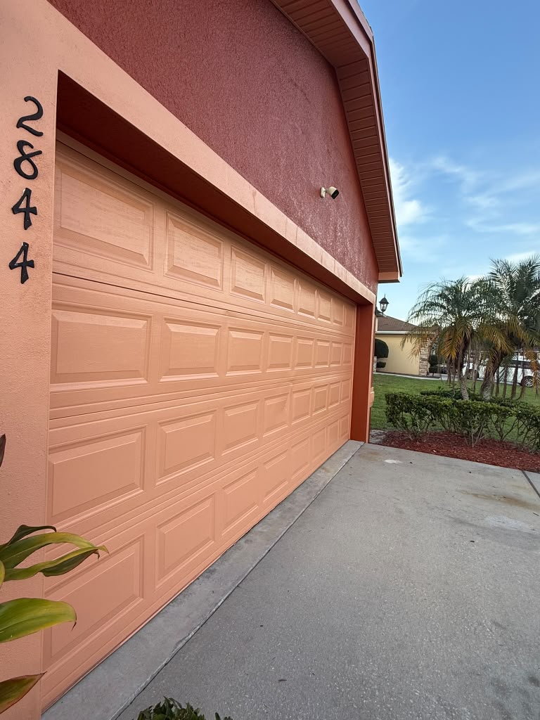 Residential garage door detail, freshly painted